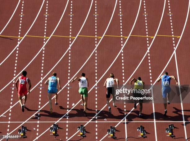 9th World Championships in Athletics, Paris, France, 26th August 2003, Mens 100m Heats, Competitors at the start of the race after just leaving their...