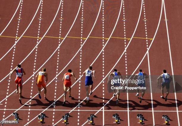 9th World Championships in Athletics, Paris, France, 26th August 2003, Mens 100m Heats, Competitors leave their starting blocks