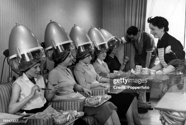 Volume 2, Page 80, Picture 2, 2nd May 1957, England, Luncheon is served to ladies under the hairdryers at the hairdressers