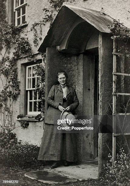 Literature Personalities, pic: circa 1900's, English author Beatrix Potter pictured outside her Kake District house near Ambleside, Beatrix Potter,...
