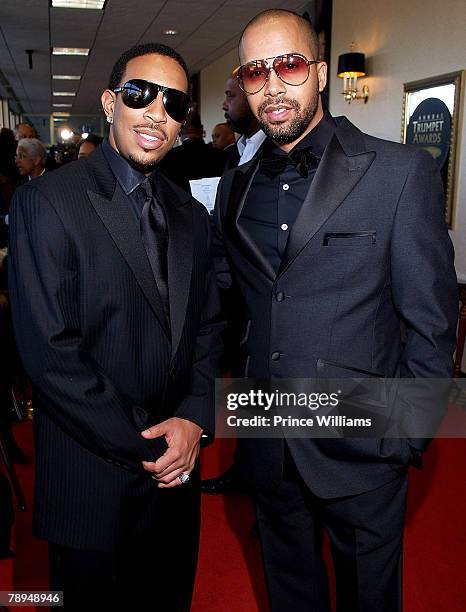 Recording artist Ludacris and TV host Kenny Burns arrive at the 16th annual Trumpet Awards January 13, 2008 at the Omni Hotel at CNN Center in...