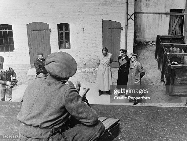 War & Conflict, World War Two Allied soldiers guard senior German Commanders captured at the end of the war, In courtyard L-R; Dr Albert Speer,...