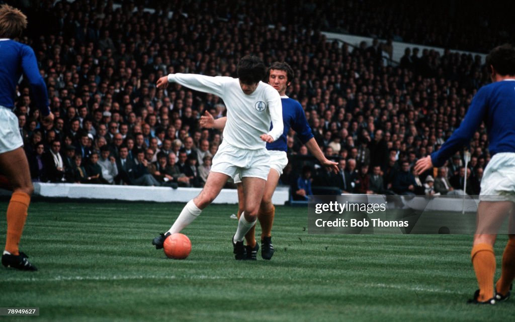 Elland Road, Leeds. Leeds United v Everton. Leeds United's Peter Lorimer is challenged by Everton players.