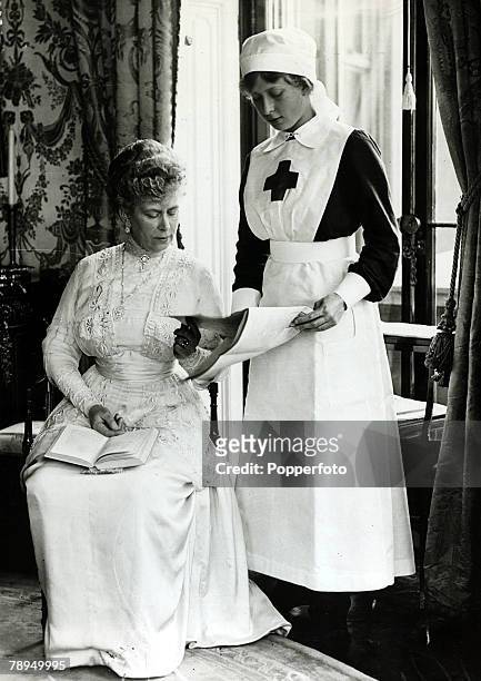 History Personalities, British Royalty, pic: 1918, HM,Queen Mary pictured with her daughter Princess Mary, the Princess Royal, who is dressed in Red...