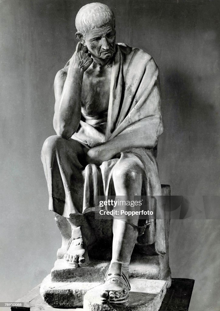 A stone statue of the famous Greek philosopher, Aristotle, (384-322 BC), who taught Alexander the Great. The statue stands in the Palace Spada, Rome Italy.