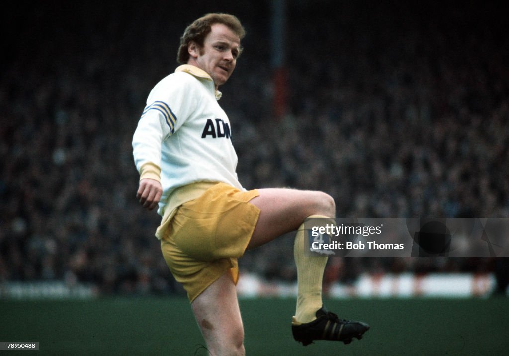 23rd February 1974. Leeds United captain and Scotland international Billy Bremner warms up before the match.