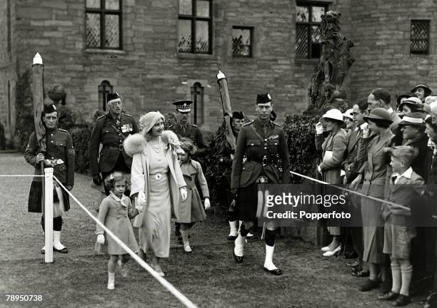 11th July 1935, HRH,The Duke and Duchess of York with their children Princess Margaret, left and Princess Elizabeth at Glamis Castle, Scotland, The...