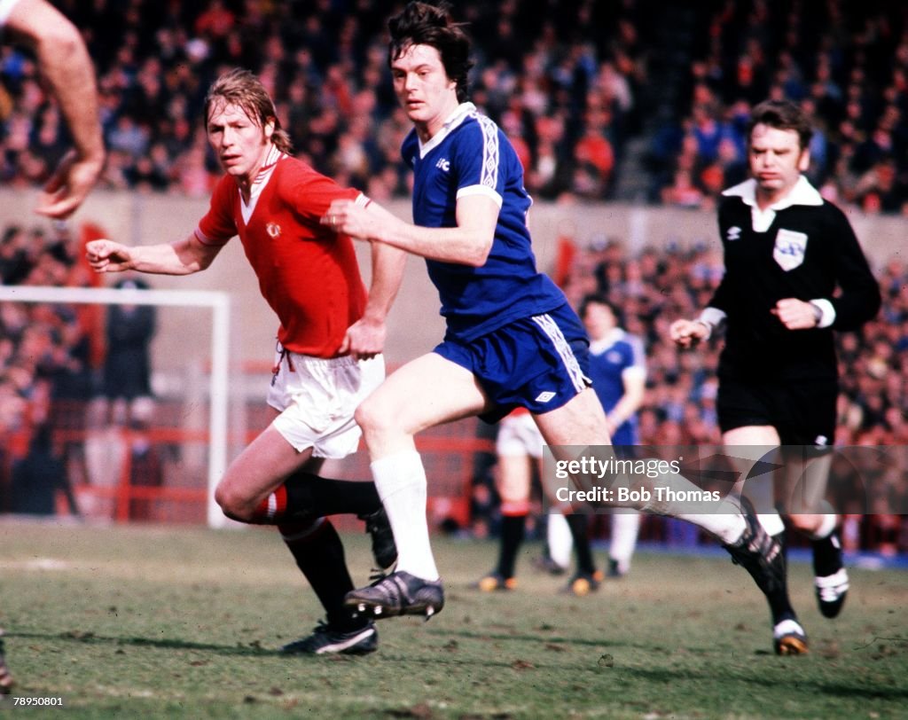 Everton v Man. Utd. Everton's Duncan McKenzie in action with United's Brian Greenhoff. 1978