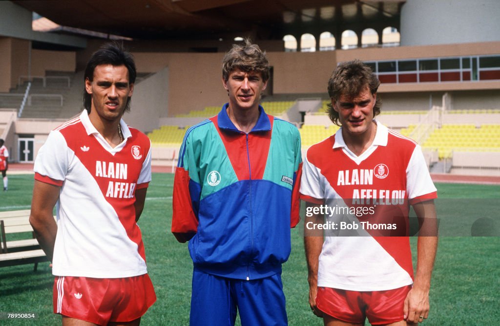 Sport. Football. pic: July 1987. England internationals Mark Hateley, left, and Glenn Hoddle with the Monaco Coach Arsene Wenger, the players recent signings for Monaco.