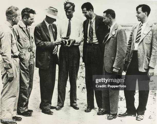 Robert Oppenheimer, US, Nuclear Physicist, , 3rd left, who was leader of the atomic bomb project set up at the Los Alamos laboratory, in New Mexico,...