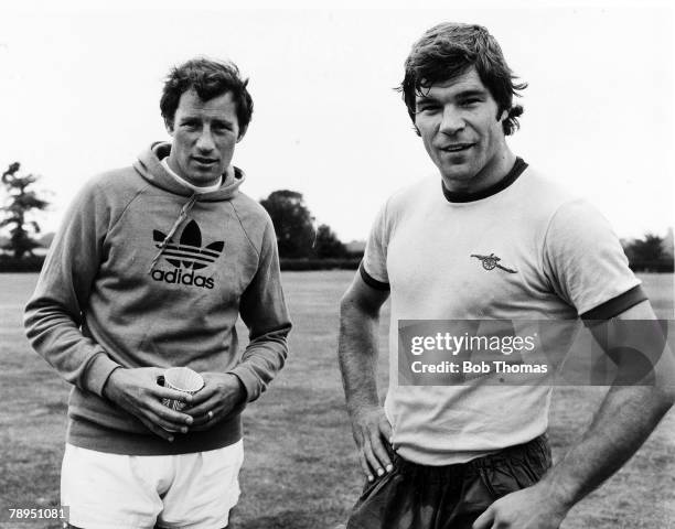 Arsenal Manager Terry Neill, left, with his new signing Malcolm MacDonald