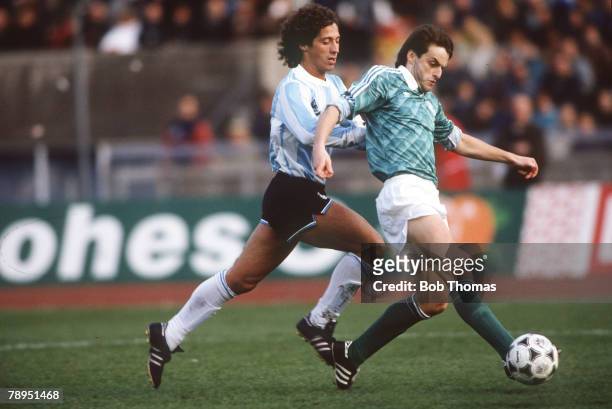 2nd April 1988, Soccer Tournament in West Berlin, Argentina 0, v West Germany 1, West Germany's Matthias Herget is challenged by Argentina's Pedro...