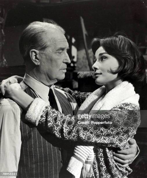 Stage and Screen, Personalities, pic: 1950's, Actress Audrey Hepburn pictured with French star Maurice Chevalier, Audrey Hepburn, born in Brussels, a...