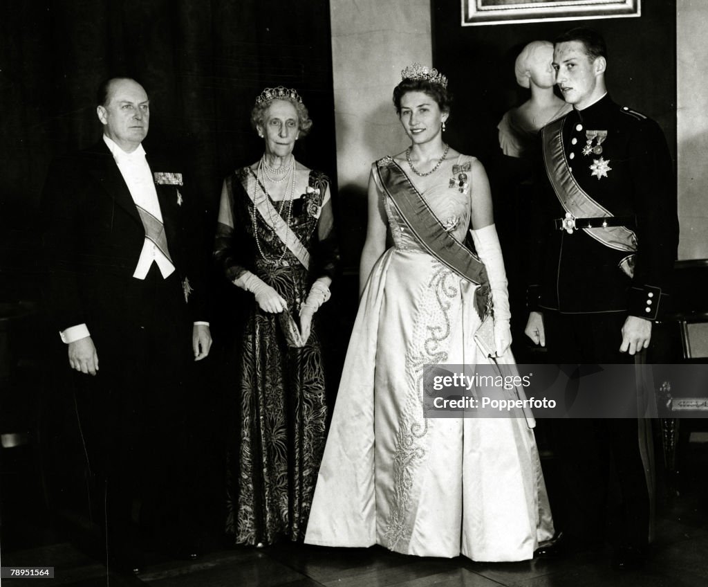 Foreign Royalty. Personalities. pic: circa 1958's. King Olav (Olaf) of Norway, left, with Princess Ingeborg, Princess Astrid, 2nd right, and Prince Harald at the Royal Palace in Oslo, at the celebrations for Prince Harald's 21st birthday. King Olav (1903-