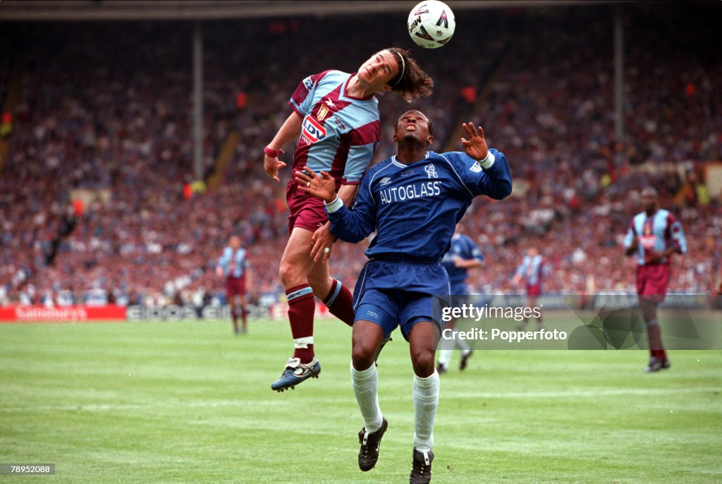 20th May 2000. Wembley, London. AXA FA Cup Final. Chelsea 1 v Aston Villa 0. Aston Villa's Benito Carbone outjumps Chelsea's Celestine Babayaro.