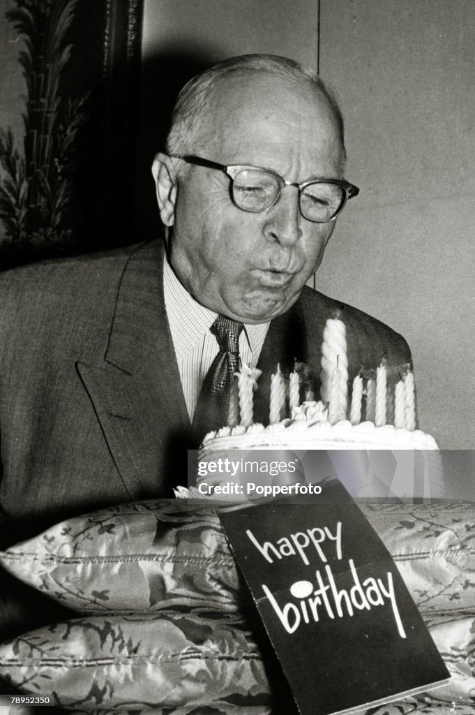 Politics. Personalities. USA. pic: 1959. Former President Harry S. Truman blows out the candles on his birthday cake to mark his 75th birthday. Harry S.Truman (1884-1972) became the 33rd President of the United States 1945-1953.