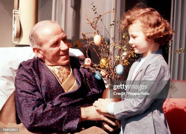 Manchester United Air Disaster, Munich, Germany, 6th February 1958, Manchester United manger Matt Busby photographed with Marianne, a young patient...