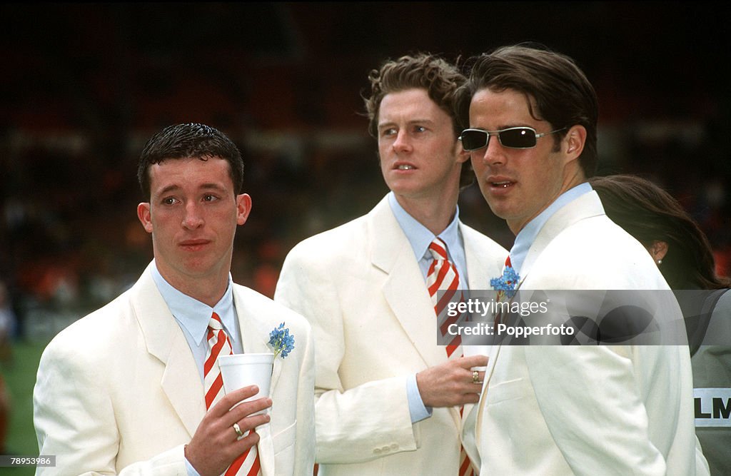 Sport. Football. pic: 11th May 1996.FA. Cup Final at Wembley. Liverpool 0. v Manchester United 1. Liverpool's, left-right, Robbie Fowler, Steve MacManaman and Jamie Redknapp smart in their matching white suits.