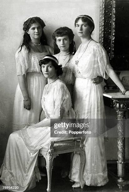 Circa 1915, The daughters of The Tsar Nicholas II and Empress Alexandra, standing from left-right, the Grand Duchesse Maria, Anastasia and Olga and...