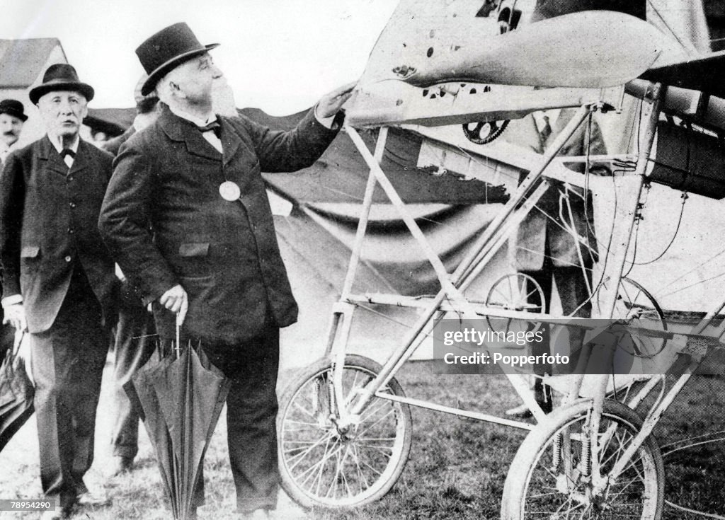 British inventor of the first automatic machine gun Sir Hiram maxim 1840 -1916, born in the USA, pictured looking at a plane.