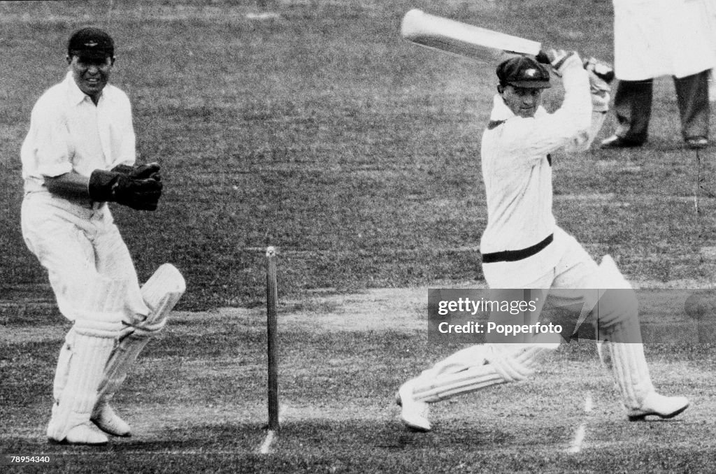 Sport. Cricket. pic: June 1934. MCC. v Australia at Lord's. Australia batsman Stan McCabe hits out as wicket-keeper Les Ames watches.