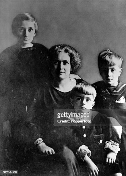 Italian fascist dictator Benito Mussolini pictured as a young boy with his mother, sister Edda and brother Vittorio