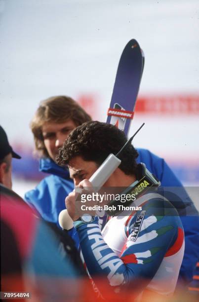 Sport, 1988 Winter Olympic Games, Calgary, Canada, Skiing, Mens Giant Slalom, Italy's Alberto Tomba celebrates his Gold medal success as he phones...