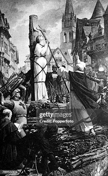 Rouen, France, 24th May 1431, French patriot and martyr Joan of Arc is tied to stake in the market place of Rouen to be burnt after being found...