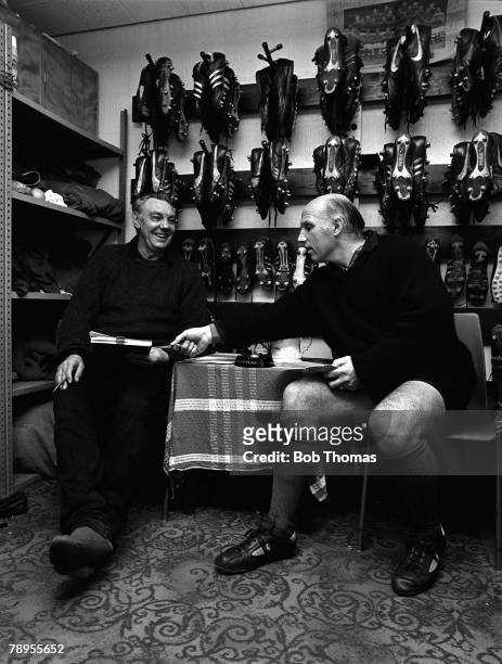 Football Liverpool+s Assistant Manager Joe Fagan and Trainer Ronnie Moran discuss business in the boot-room at Anfield