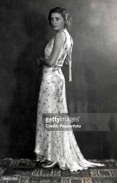 Full length portrait of Countess Edda Ciano, daughter of Italian fascist dictator Benito Mussolini, wearing a long dress