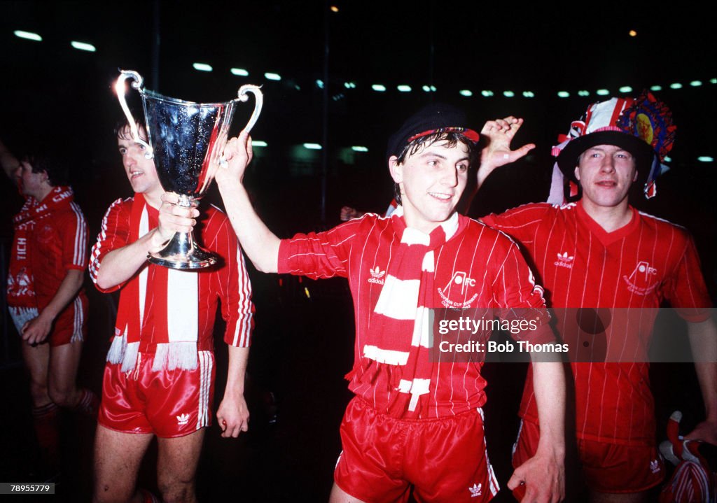 11th May 1983. European Cup Winners Cup Final. Aberdeen 2 v Real Madrid 1. Aberdeen's John Hewitt carries the trophy with Peter Weir during the lap of honour.