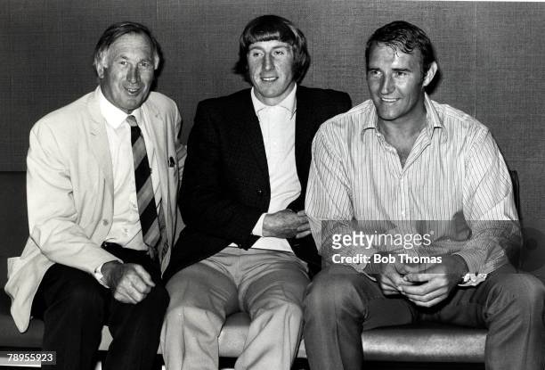 21st July 1971, Malcolm Allison, Manchester City Coach is pictured with City Manager Joe Mercer and their new signing striker Wyn Davies, Allison was...