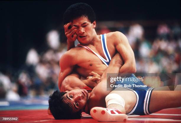 Sport, Goodwill Games, Seattle, USA, July 1990, Wrestling, 52 Kg, Hideo Sasayadia of Japan has his eye gouged as he pins down Mustafa Cetin of Turkey