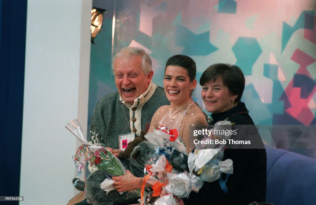 Sport. 1994 Winter Olympic Games. Lillehammer, Norway. Ice Skating. Ladies Figure Skating Singles. Nancy Kerrigan, USA, the Silver medal winner celebrating with her coaches.