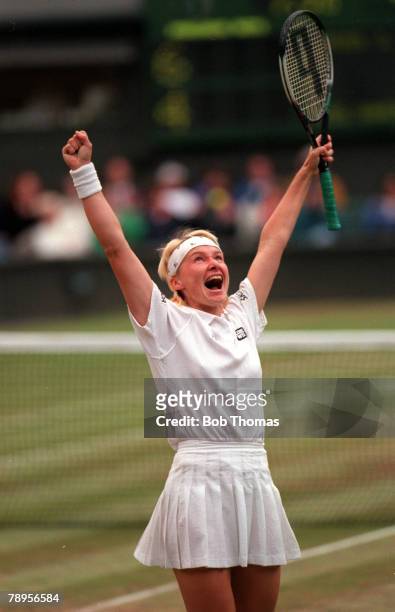 Tennis, All England Lawn Tennis Championships, Wimbledon Ladies Singles Semi Final, Czech Republic's Jana Novotna throws her arms up in celebration...
