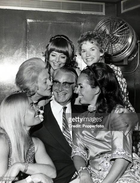 Entertainment, London, England, 18th July 1969, Film Director Ken Annakin poses with guests at his party for stars who have appeared in his films,...