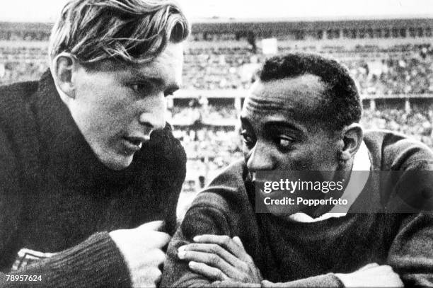 Olympic Games, Berlin, Germany, Men's Long Jump, USA's gold-medalist Jesse Owens talks to German silver medallist Luz Long.