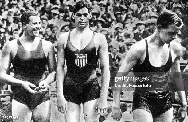 From left, silver medallist Arne Borg of Sweden, gold medallist Johnny Weissmuller of the United States and bronze medallist Boy Charlton of...