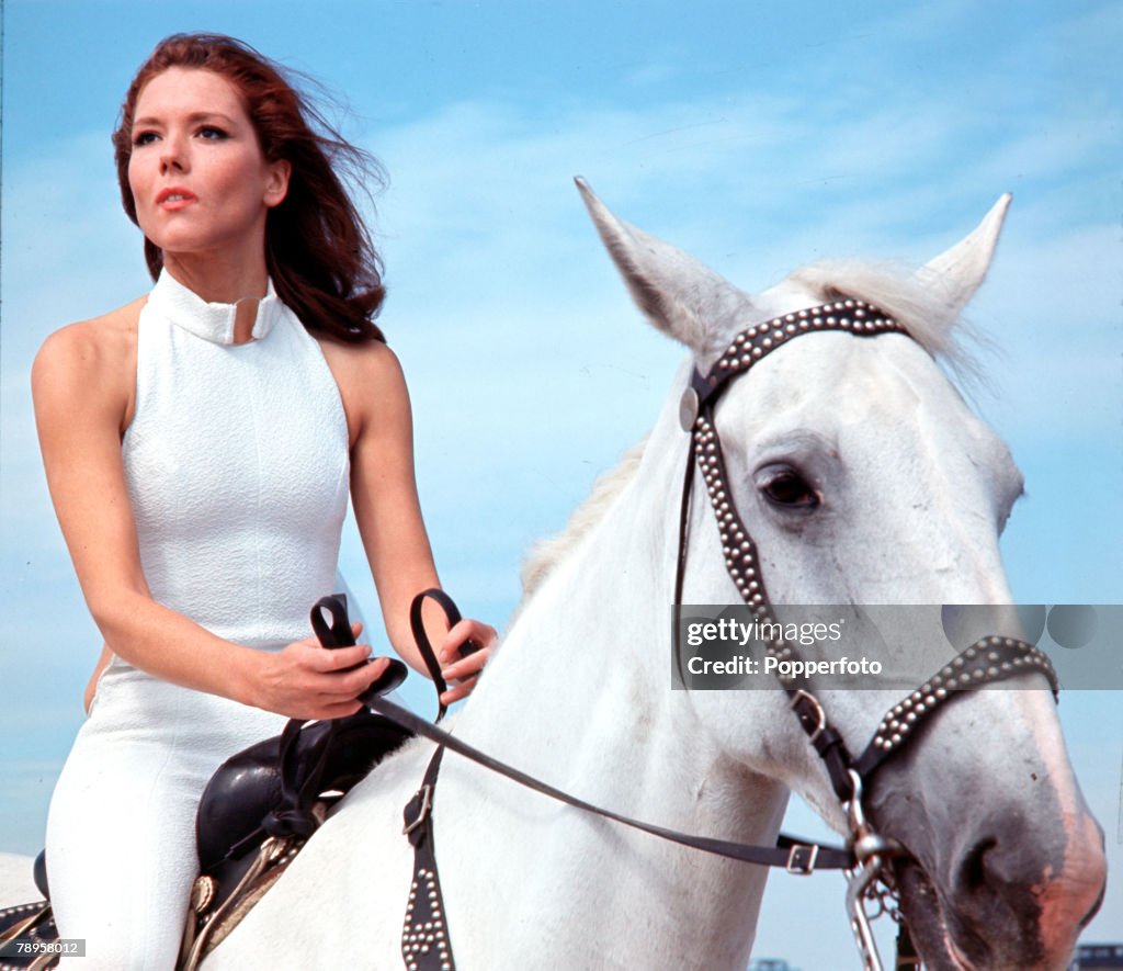 England. 1968. Diana Rigg is pictured riding a horse in her role as Emma Peel in the television series "The Avengers".