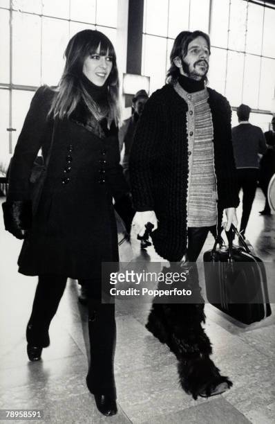 Music, Personalities, pic: 25th February 1971, The Beatles drummer Ringo Starr, dressed in long fur boots and leather trousers at London's Heathrow...