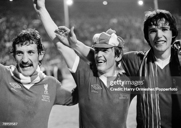 Terry McDermott , Kenny Dalglish and Alan Hansen of Liverpool celebrate after the European Cup Final between Liverpool and Club Brugge at Wembley...