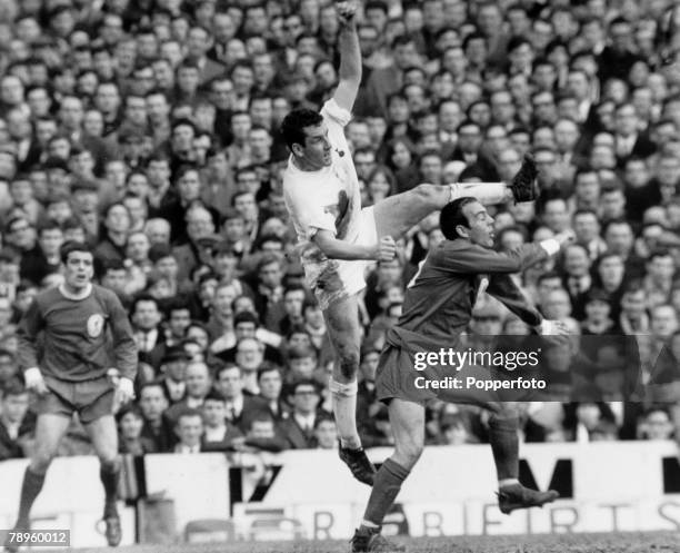 9th March 1968, Division 1, Tottenham Hotspur v Liverpool at White Hart Lane, Tottenham Hotspur captain Dave Mackay outjumps Liverpool's Ian St, John