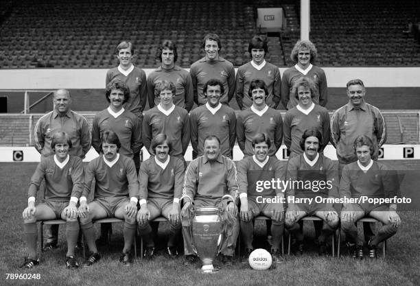 Liverpool FC line up for a team photograph with the European Cup trophy at Anfield in Liverpool, England, circa August 1978. Back row : Joey Jones,...