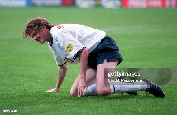 Football, European Championships, ,Portugal v England , Eindhoven, Holland,12th, June England's Steve McManaman on his knees after taking a knock, he...