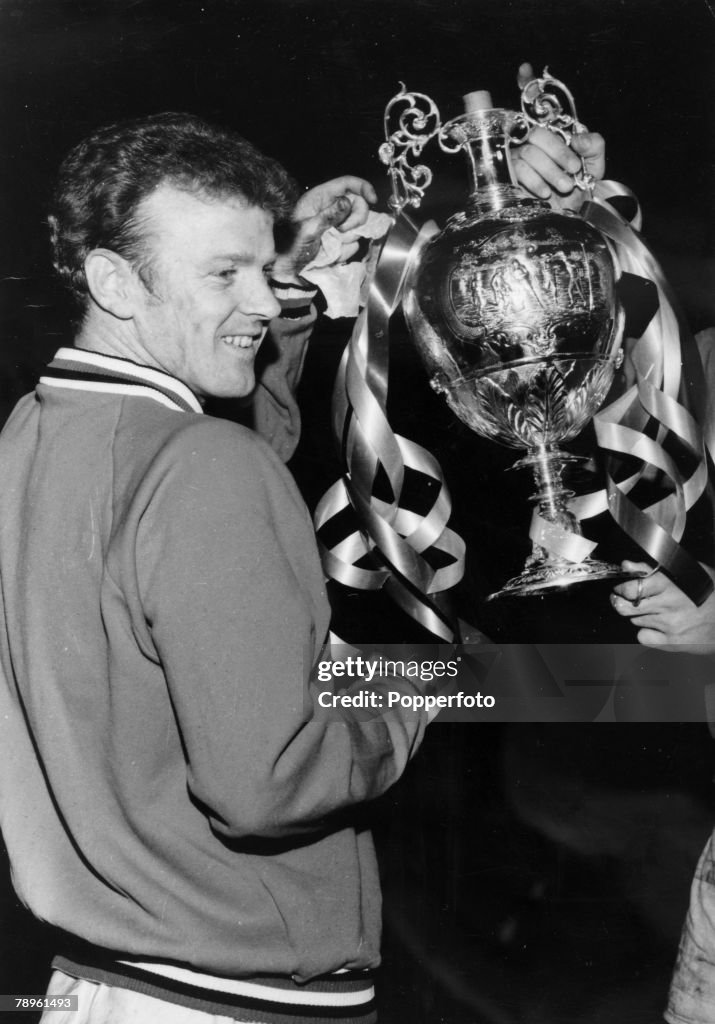 Sport. Football. pic: 1969. Leeds United captain Billy Bremner holding the First Division Championship trophy.