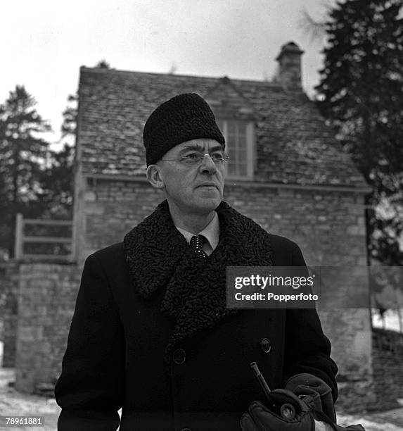 World War II, Gloucestershire, England A portrait of Sir Stafford Cripps wearing a Russian cossack hat at his Oakridge home, Cripps was a Labour...