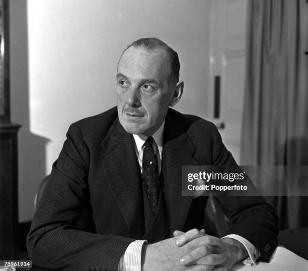 British businessman and politician Oliver Lyttelton , President of the Board of Trade in Winston Churchill's wartime coalition government, seated at...