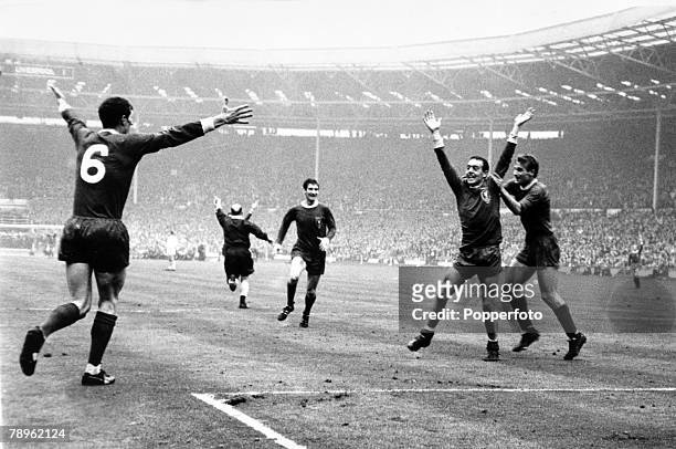 1st May 1965, FA, Cup Final at Wembley, Liverpool 2 v Leeds United 1, a,e,t, Liverpool's Ian St John is grabbed by team-mate Roger Hunt, after St,...