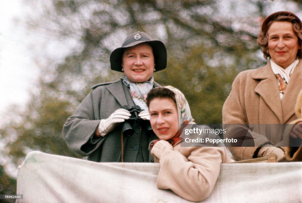 England. 1957. Queen Elizabeth II (front) and the Queen Mother are pictured at the Badminton Horse Trials.