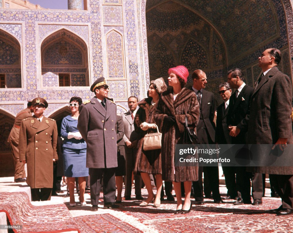 1961. Royal Tour to Iran. Queen Elizabeth II and Prince Philip, the Duke of Edinburgh, are pictured with the Shah of Persia and Queen Farah as they visit Esfahan.